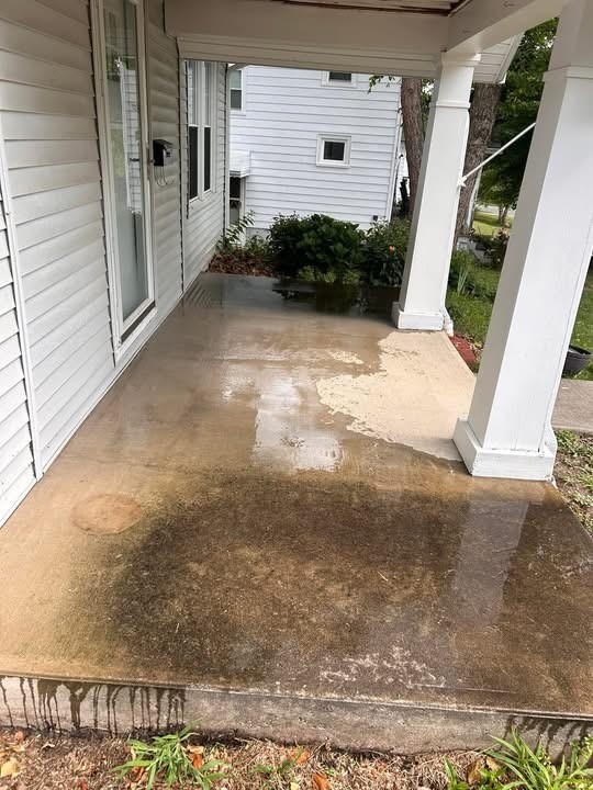 Concrete porch before pressure washing